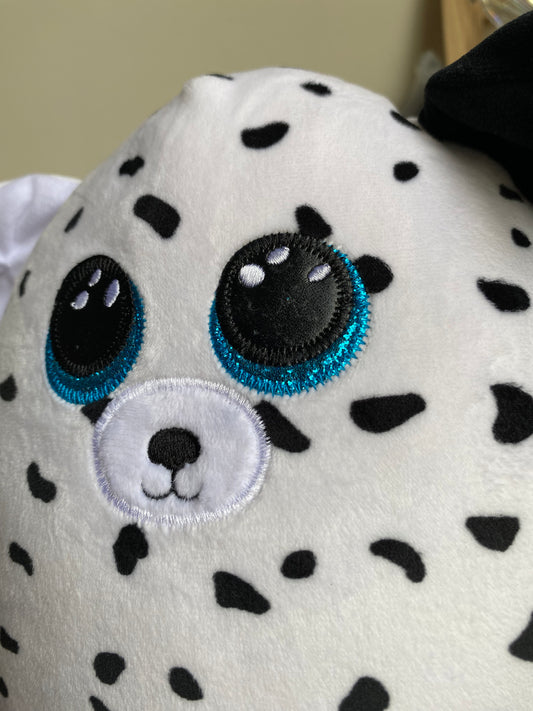 Dalmatian-themed plush toy from the Ty Squish. Fetch is a black and white Dalmatian dog with blue eyes and one black ear