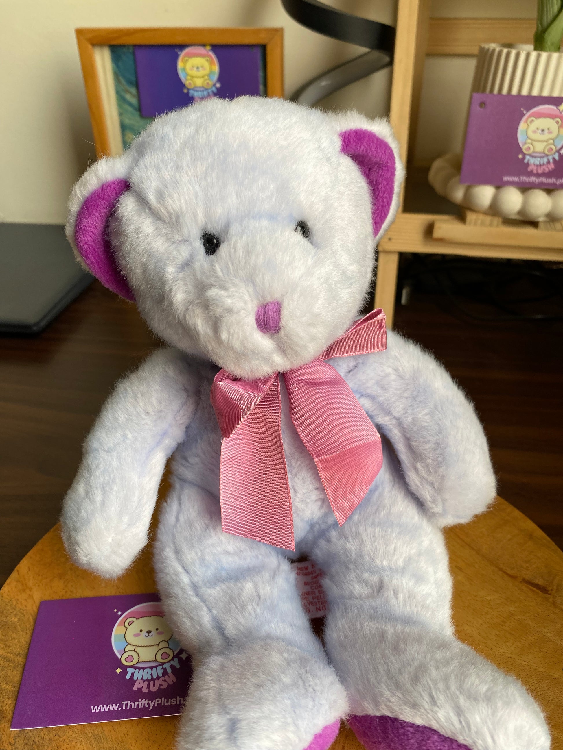 Side angle of Zodiac Bear with scarf or bow accessory