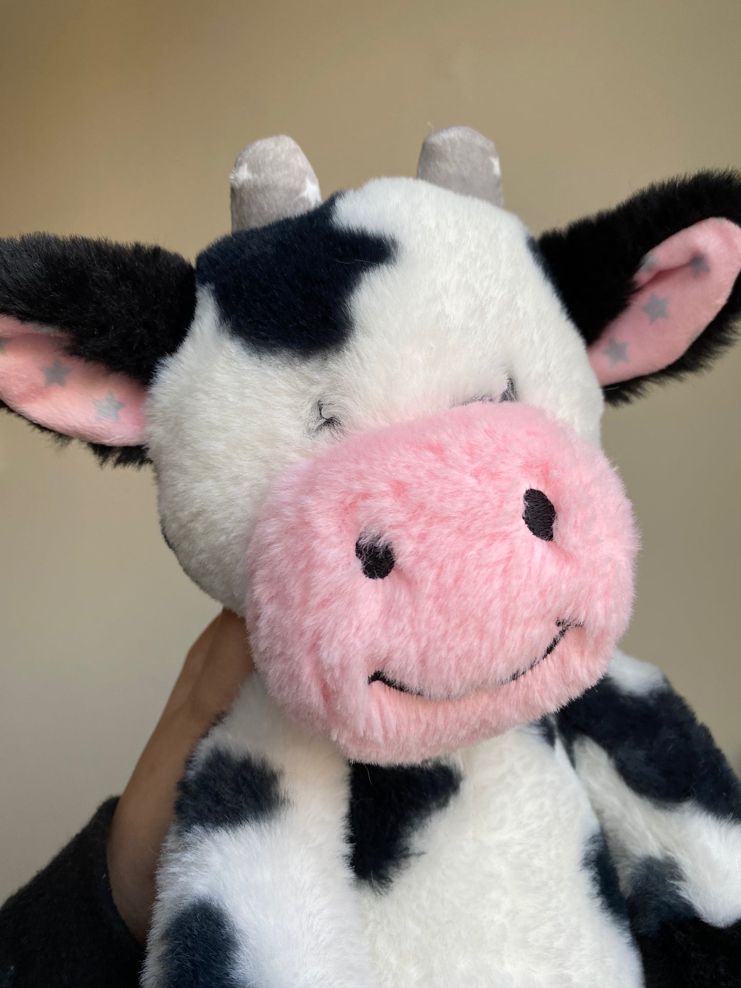 Black and white Worlds Softest Plush cow stuffed animal.