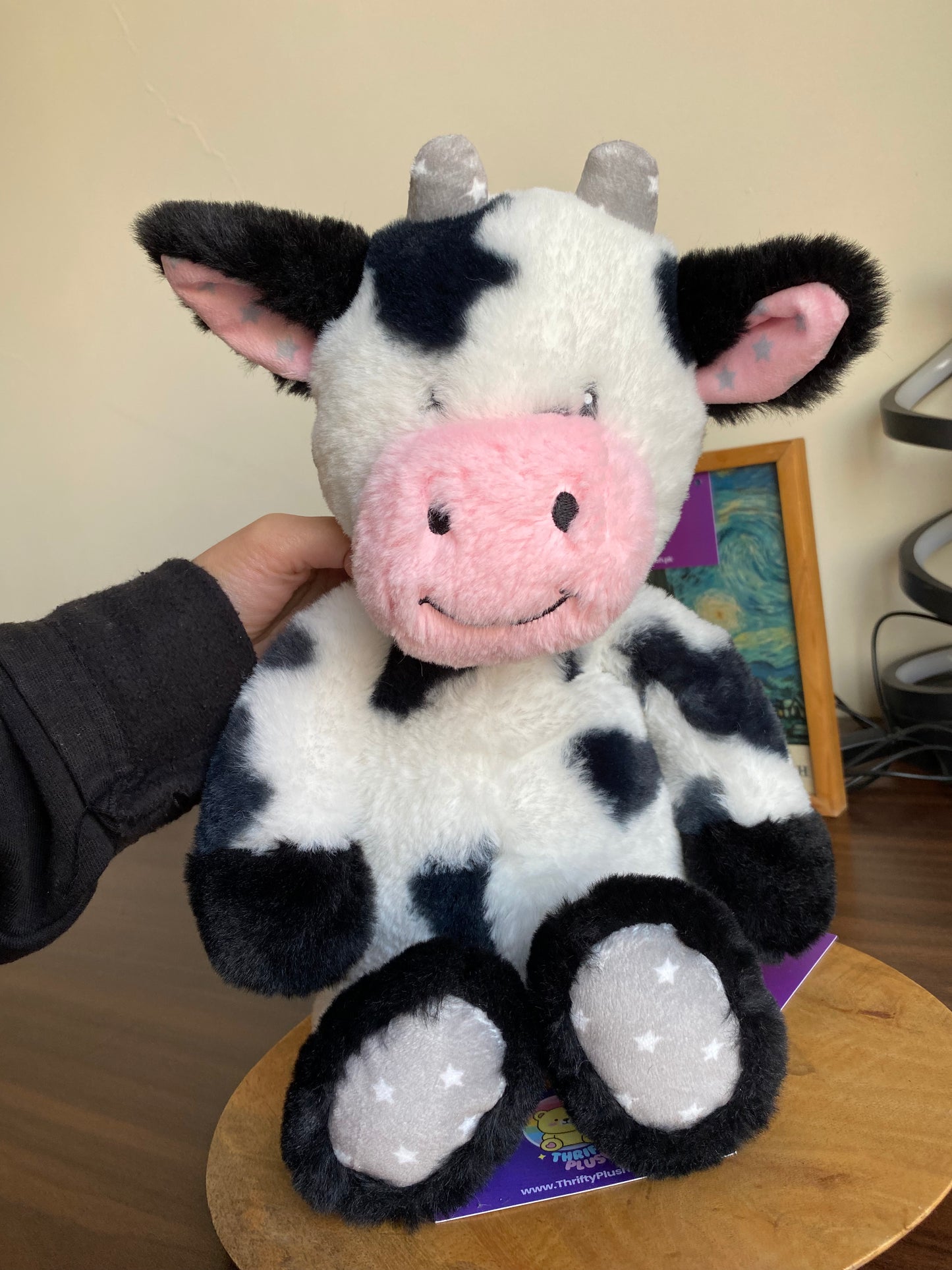 Black and white Worlds Softest Plush cow stuffed animal.