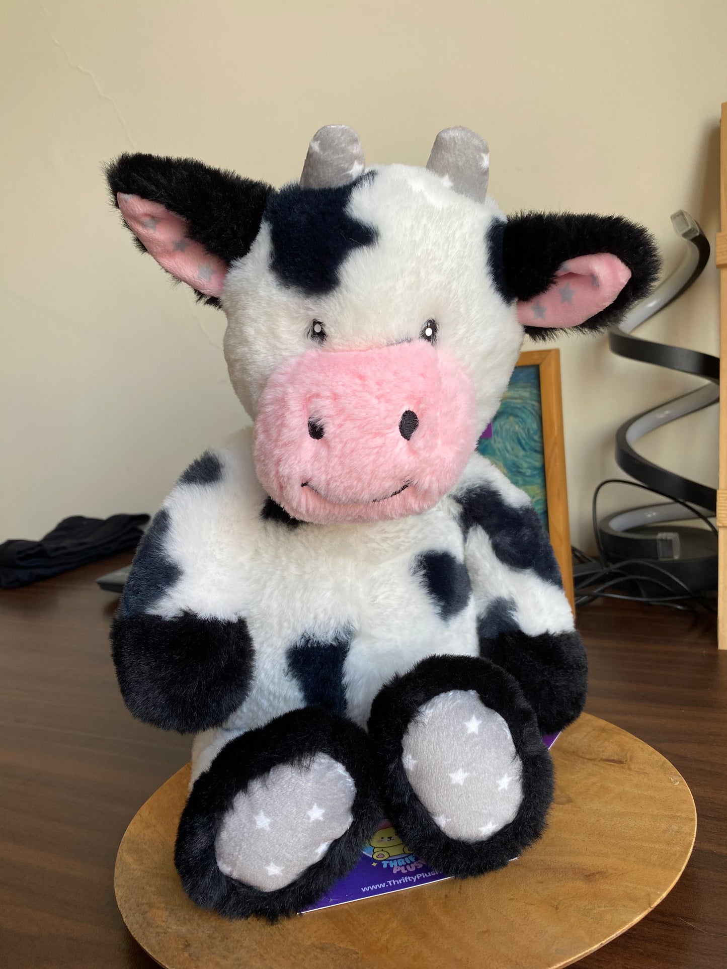 Black and white Worlds Softest Plush cow stuffed animal.