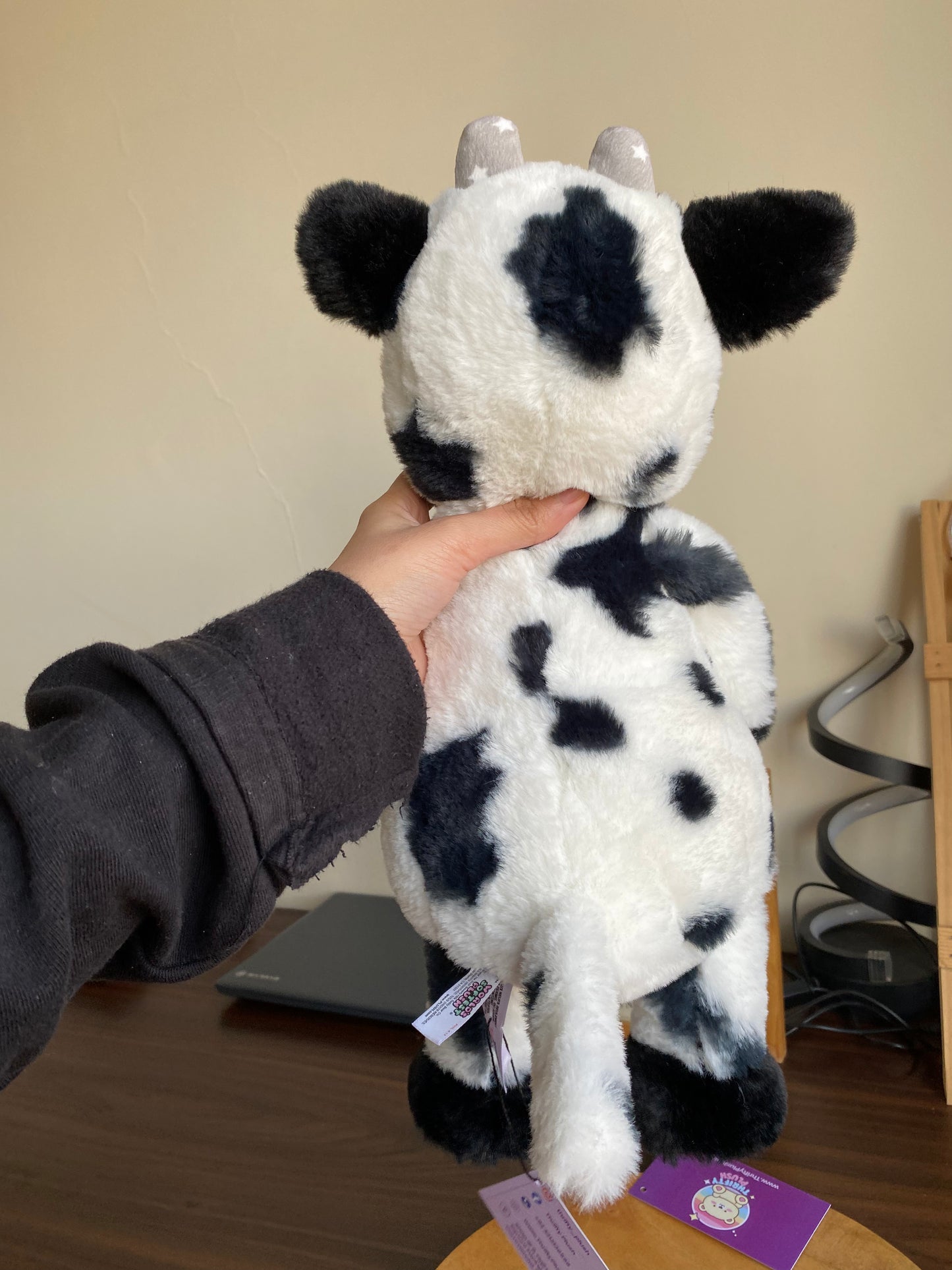 Black and white Worlds Softest Plush cow stuffed animal.