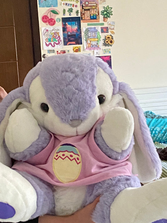 Giant purple bunny plush toy sitting on chair – kids stuffed animal gift Pakistan