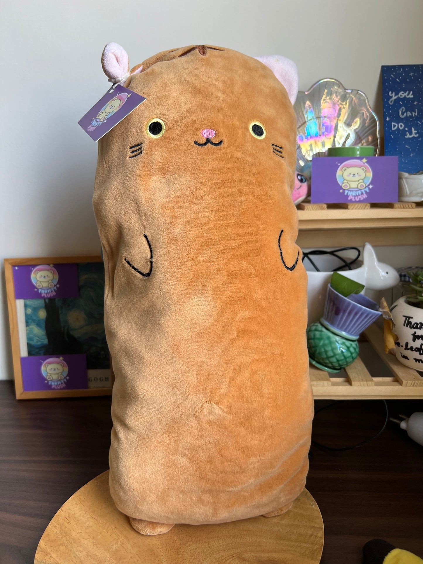 Orange Cat Plush Pillow With A Cute, Simplistic Face.