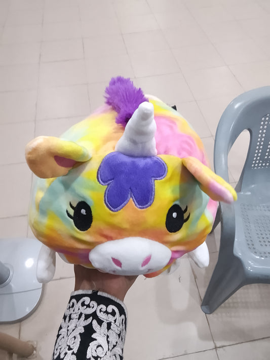 Fiesta Tie-Dye Rainbow Unicorn pillow plush stuffed animal colorful pastel tie-dye pattern and a purple mane.