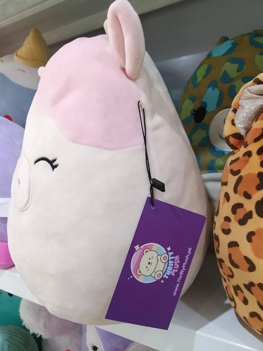 Squishmallows Caedyn the Cow plush toy.