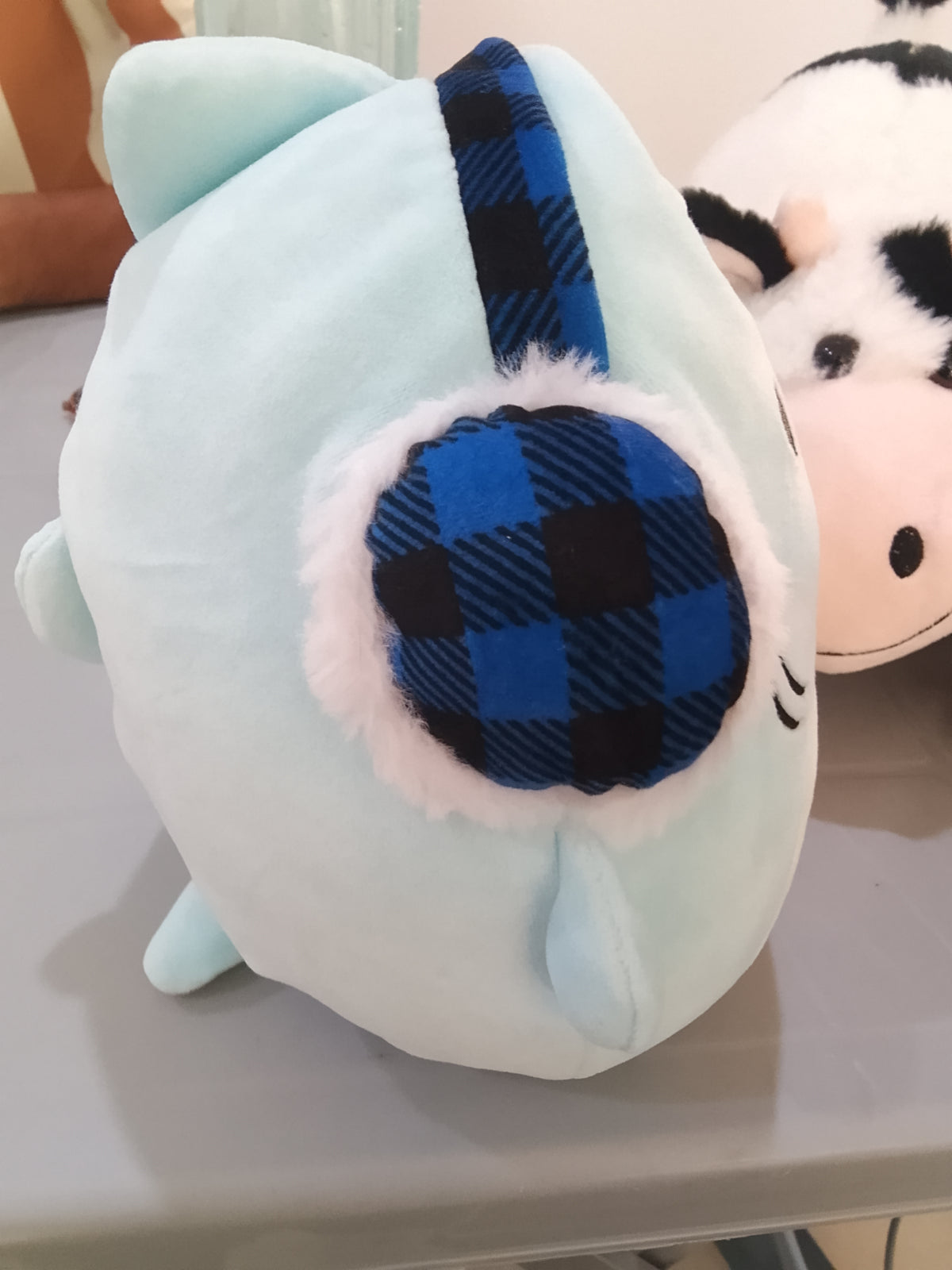 Squishmallows Sharon the Shark Holiday plush featuring festive earmuffs