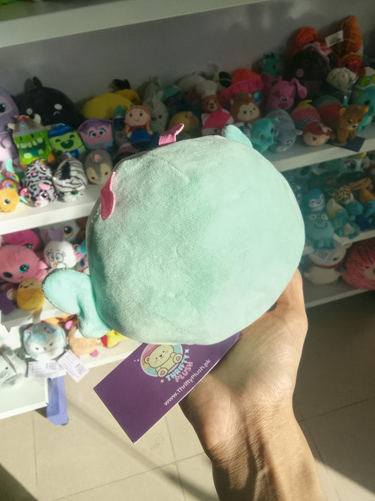 Squishmallow Kellytoy Flip-A-Mallow plush that reverses from a mint-colored butterfly to a pink axolotl