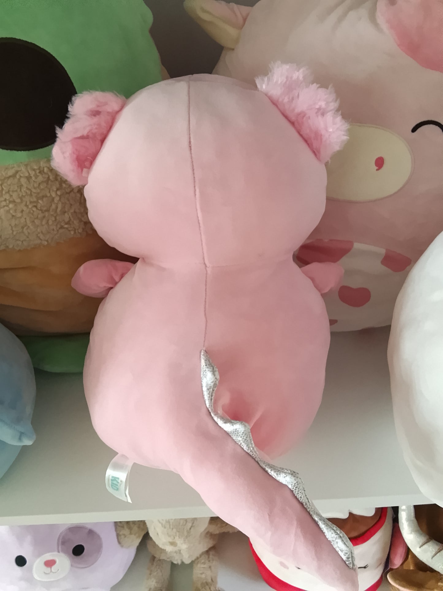 Squishmallows Archie the Axolotl plush toy.