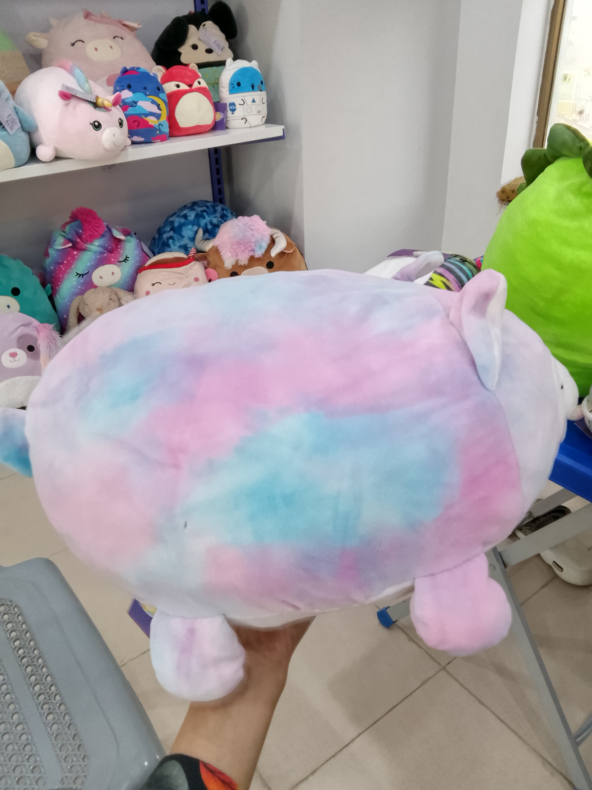 Squishmallows Lana the Rainbow Lamb Sleepamallow plush toy.