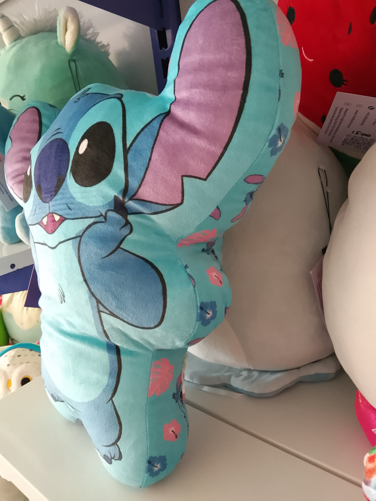 Disney Lilo & Stitch themed plush character pillow.
