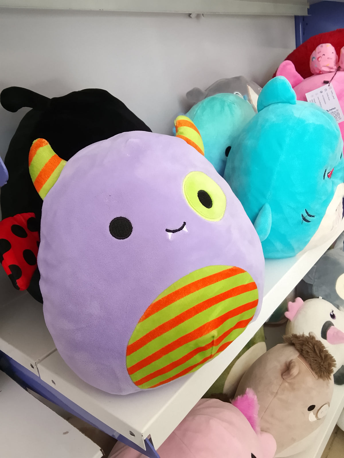 Squishmallows Marvin the Monster Halloween Treat Pail plush toy.