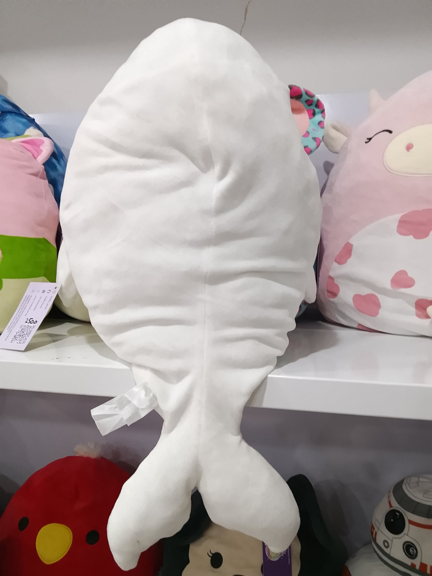 White Beluga Whale plush toy, likely from a collection of sea-themed stuffed animals.