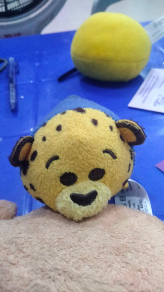 Disney Tsum Tsum mini plush of Officer Clawhauser from Zootopia.