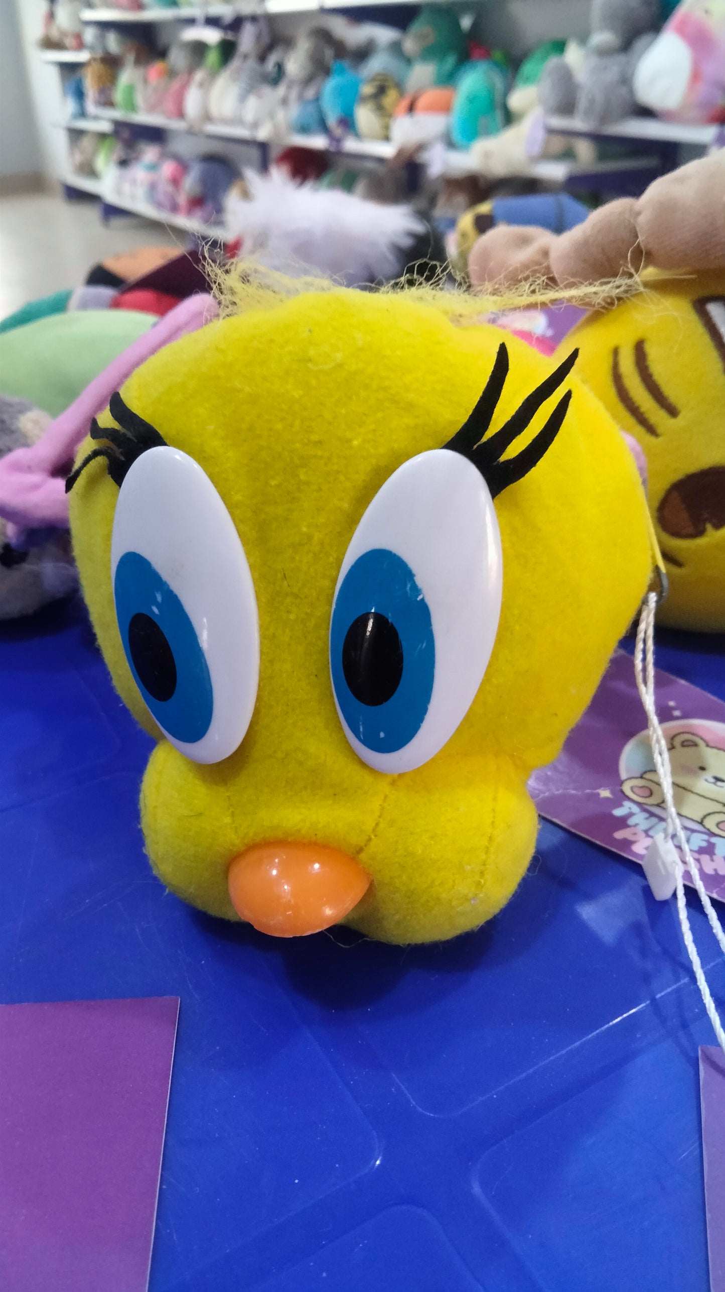 This is a Looney Tunes Tweety plush stuffed toy