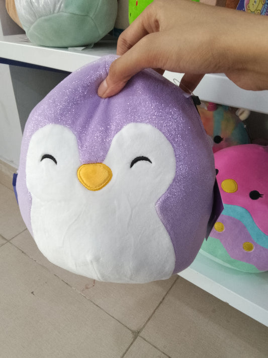 Squishmallows plush toy of Elle the Penguin in purple.