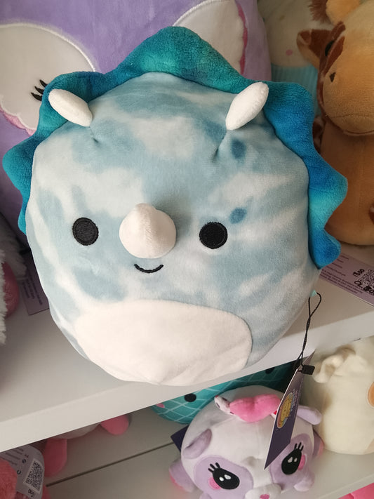Squishmallows Jerome The Blue Triceratops plush toy.