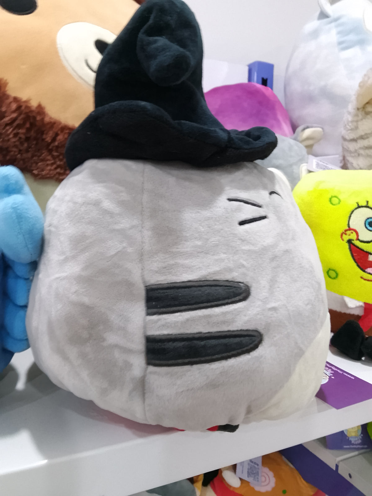 Halloween Squishmallows Flip-A-Mallow Tally the Cat plush toy.