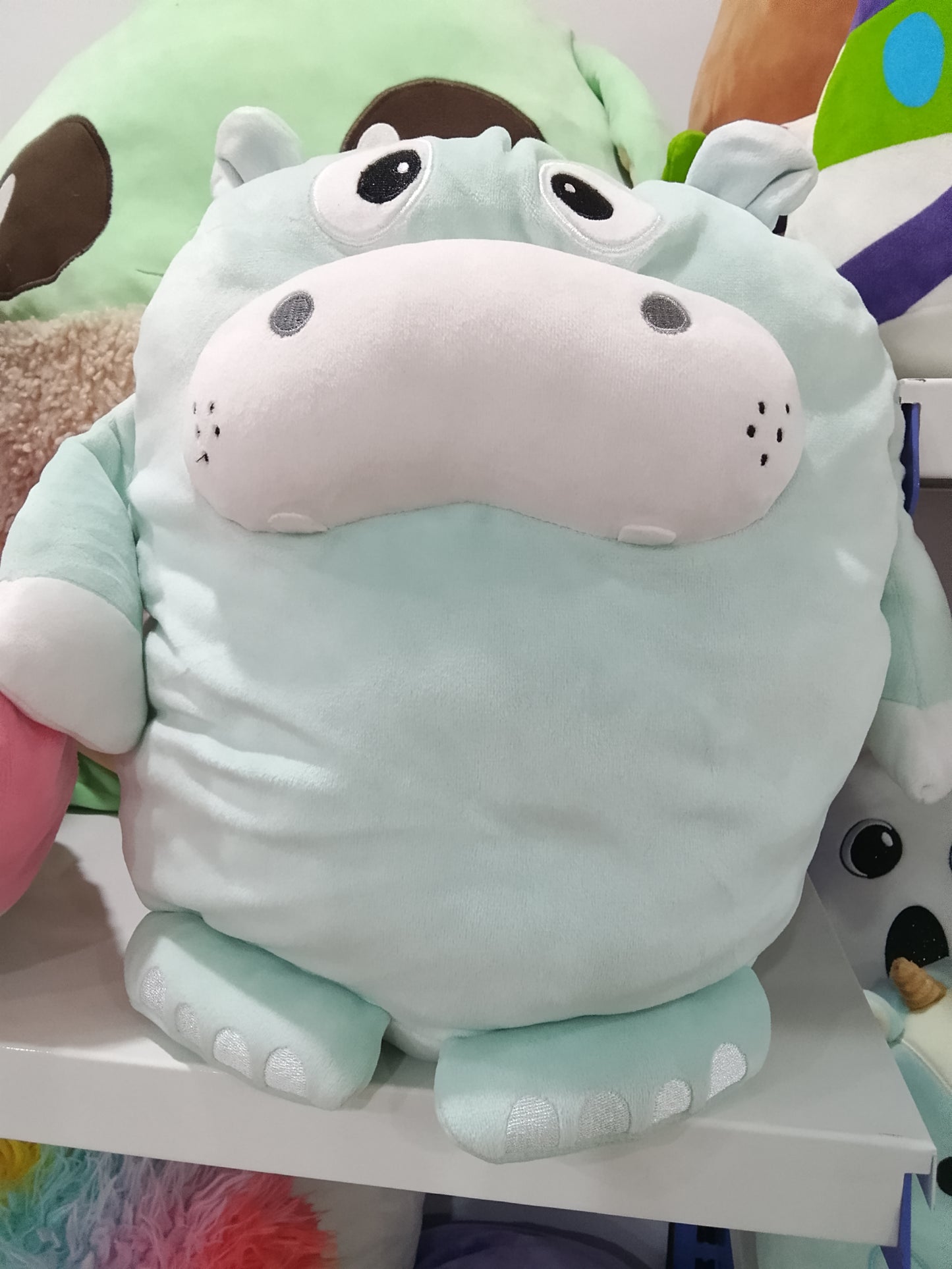 Mint green Hippo Plush Toy.