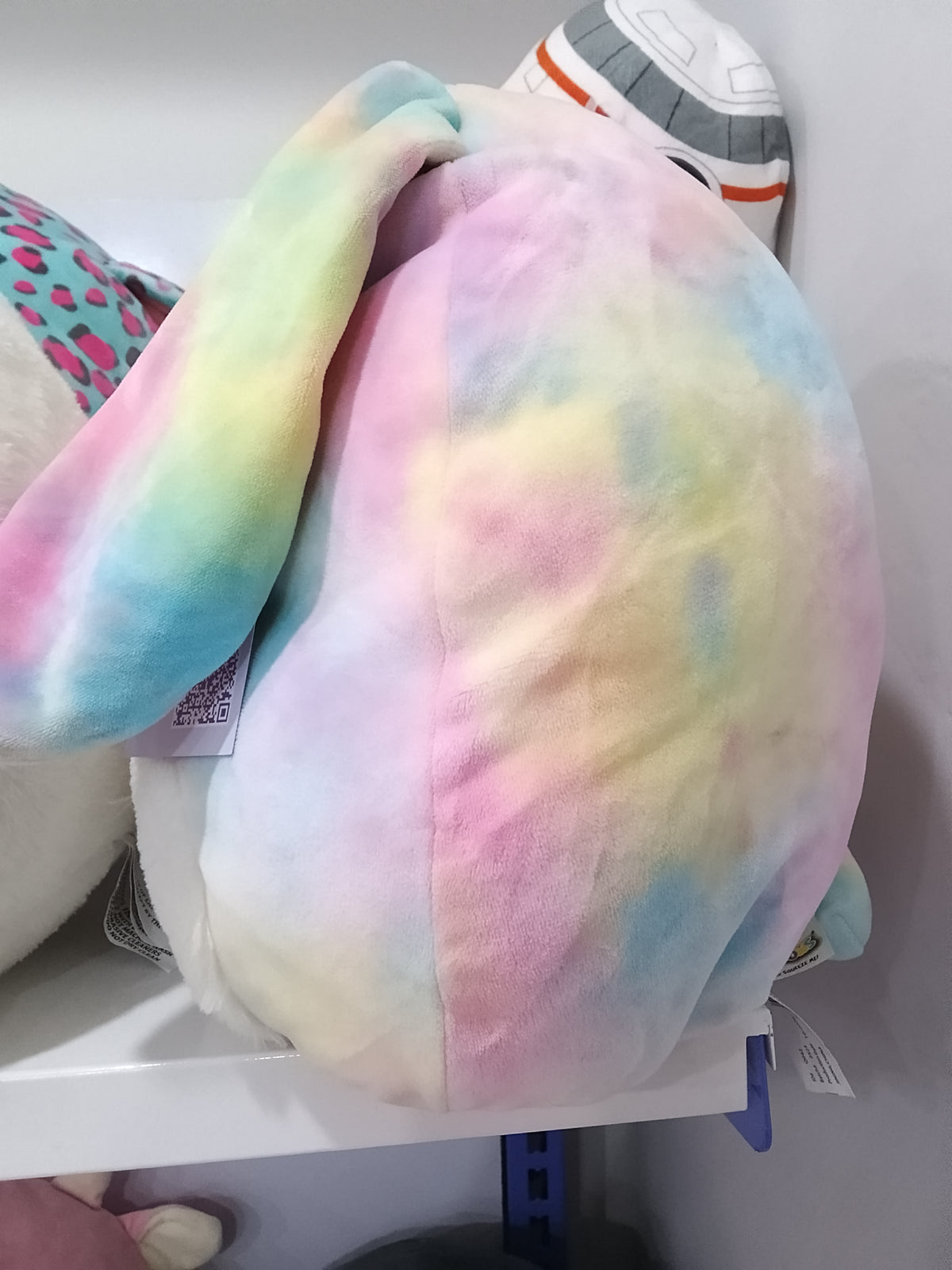 Squishmallows Candy the Rainbow Bunny plush toy.