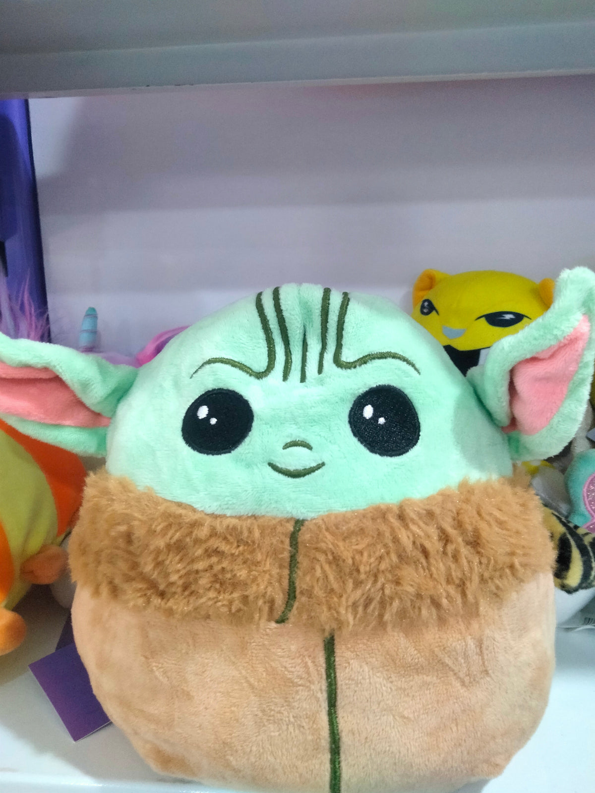 Squishmallows Star Wars plush toy featuring Baby Yoda