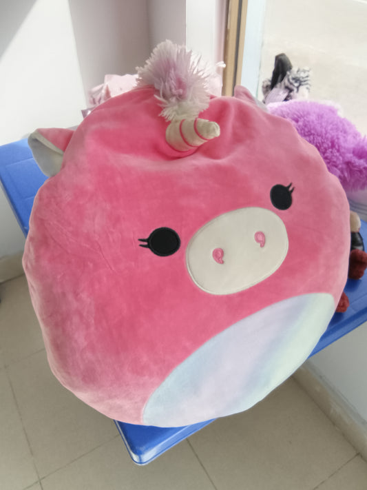 Kellytoy Squishmallows Sena the Pink Unicorn plush toy, soft pink exterior and a rainbow horn.