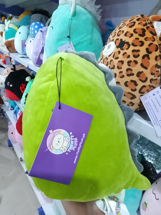 Squishmallows green dinosaur character, likely Danny or Arlie plush toy.