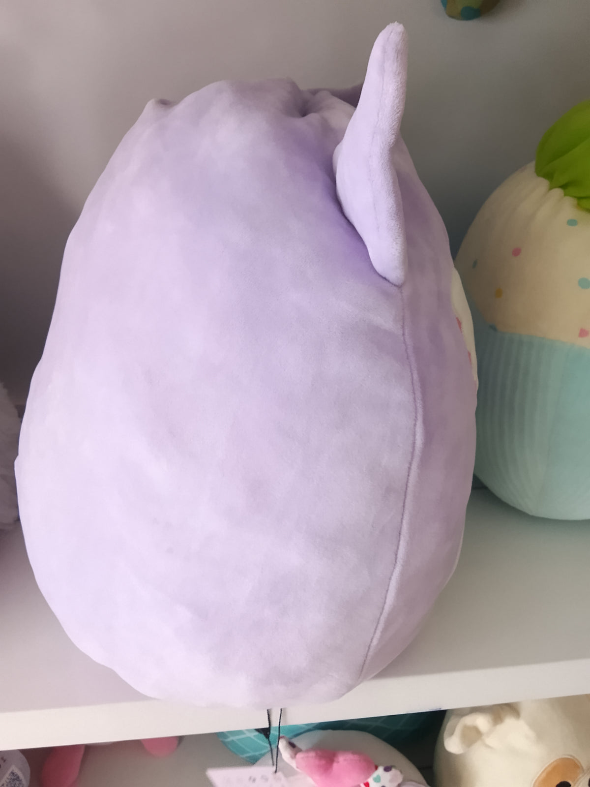 Squishmallows plush toy featuring Miranda the Purple Owl