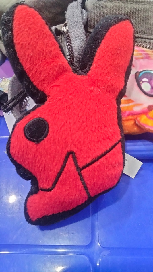 This is a red Playboy bunny plush pillow.