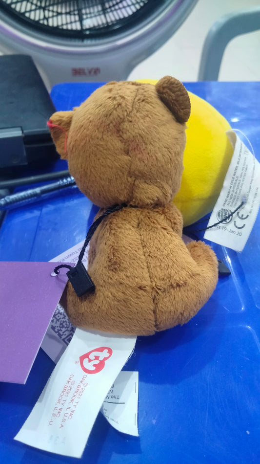 brown Ty McDonald's Happy Meal plush toy of Henry the Bear