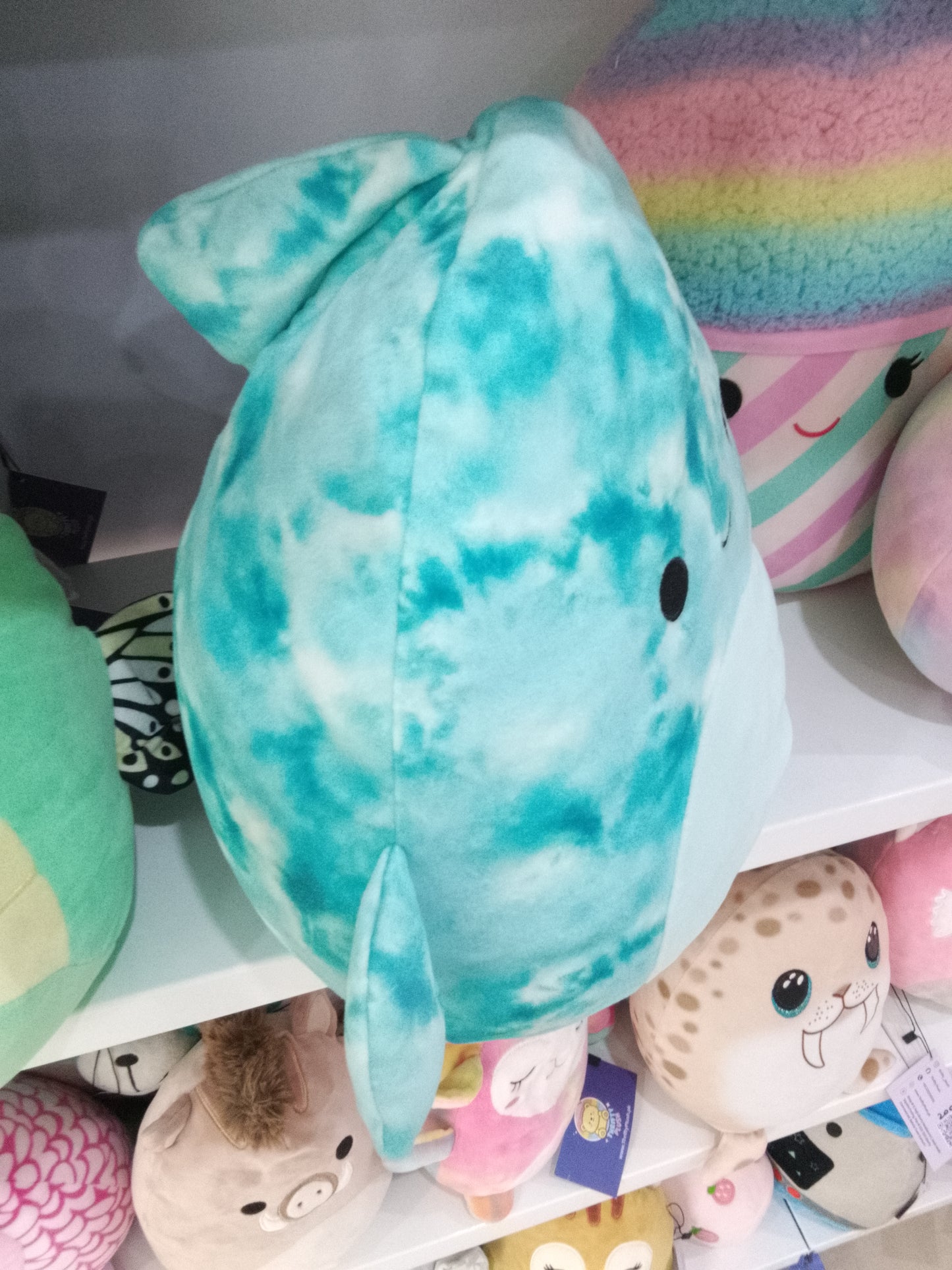 Squishmallows Danika the Blue Tie-Dye Dolphin plush toy.
