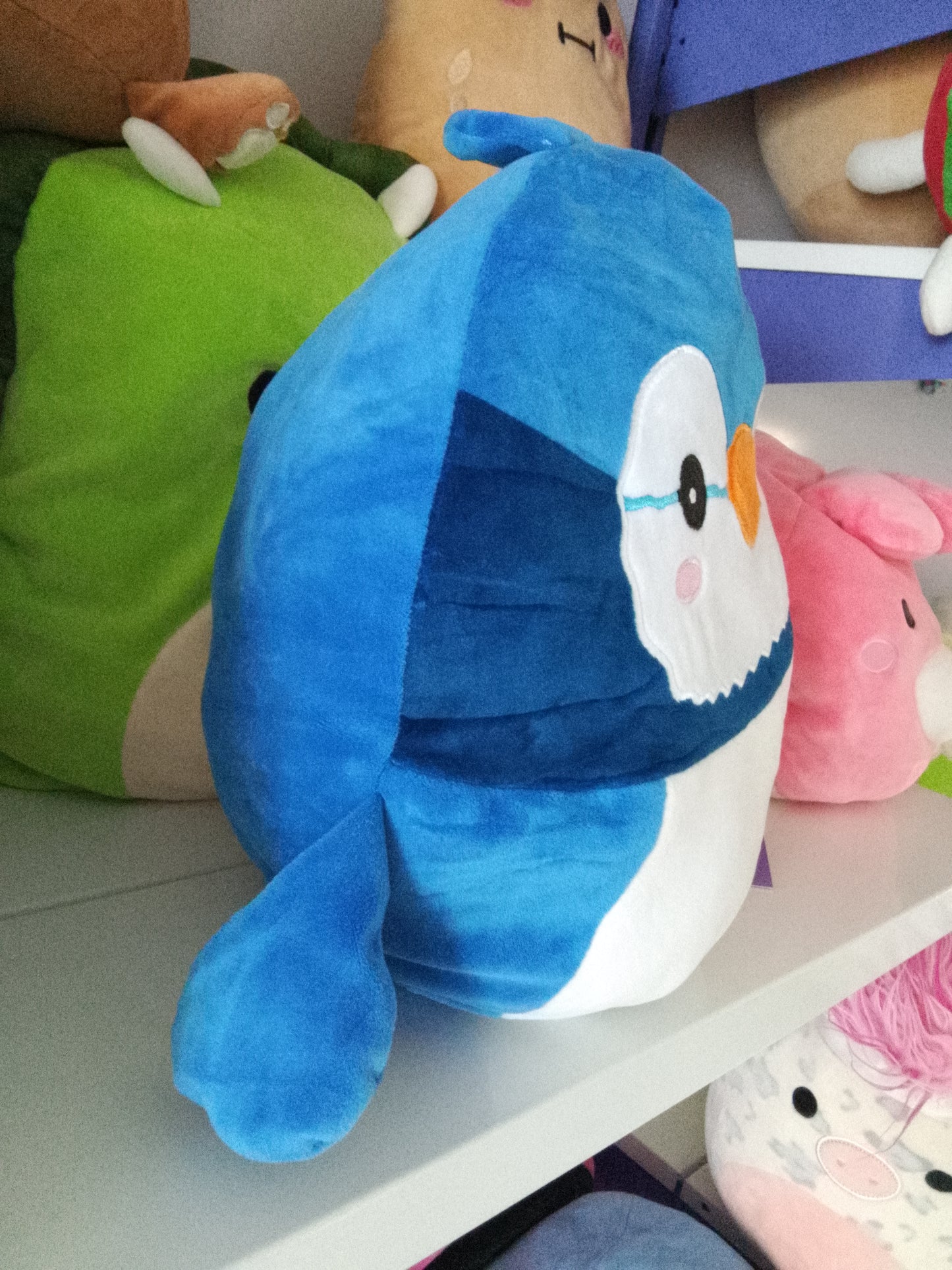 Squishmallows Babs the Blue Jay stuffed plush toy.