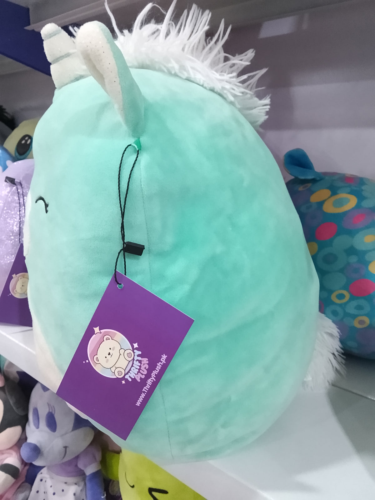 Squishmallows Squish-Doos Kennedy the Unicorn Plush toy.
