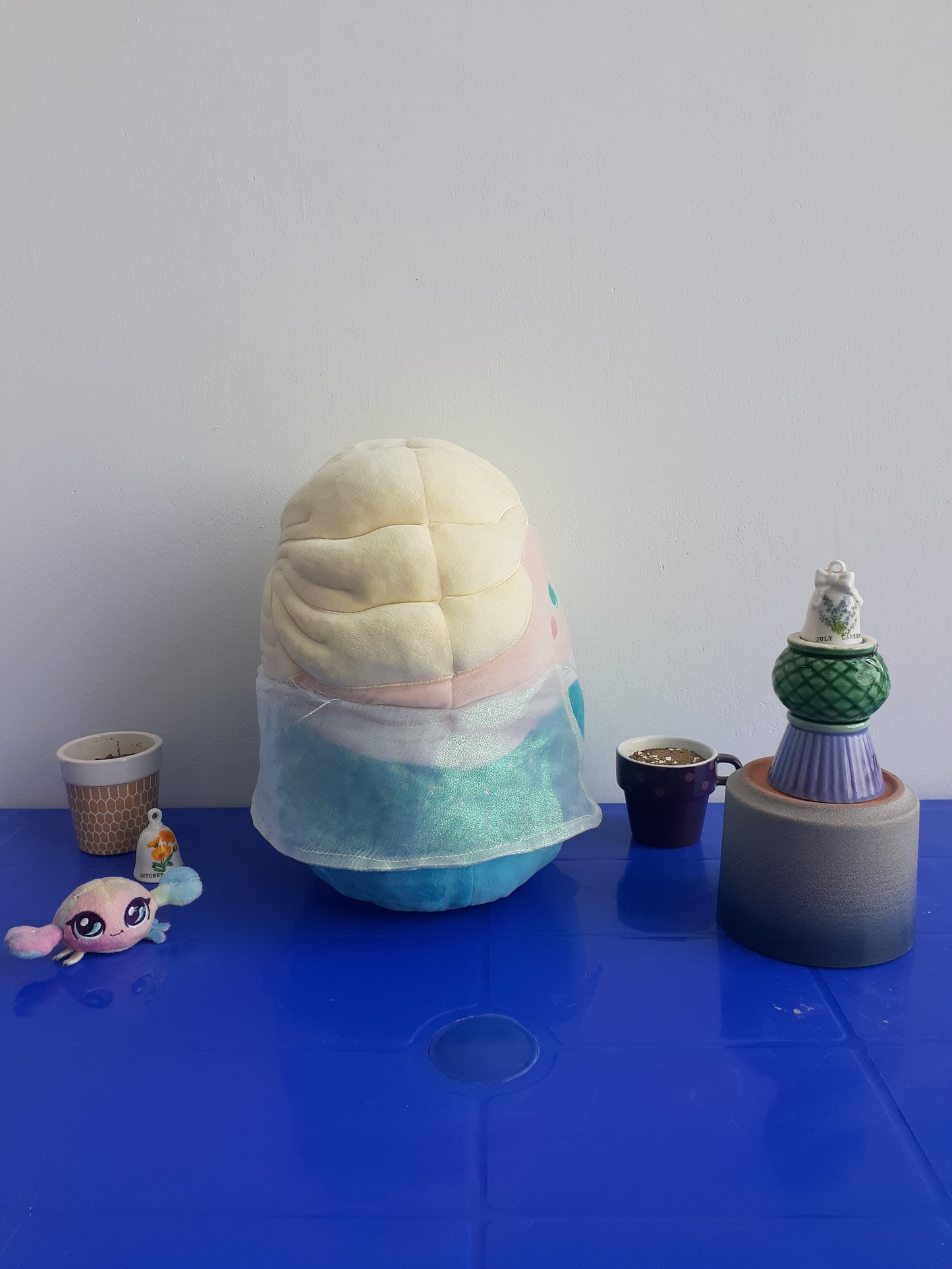 Squishmallow Plushie Of Elsa from Disney's Frozen.