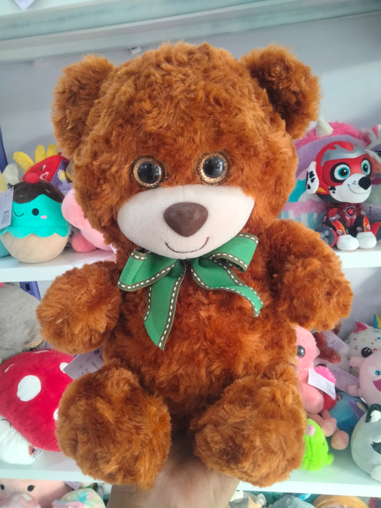 Brown plush teddy bear.