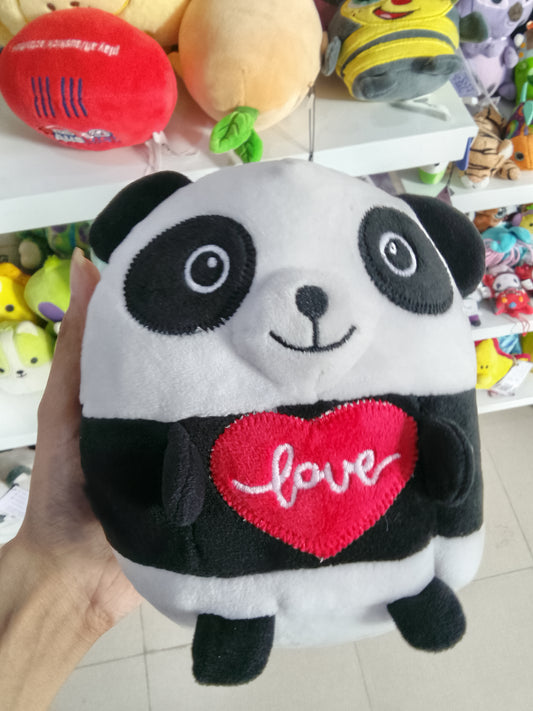 Nici Chill Panda plush toy holding a red heart cushion.