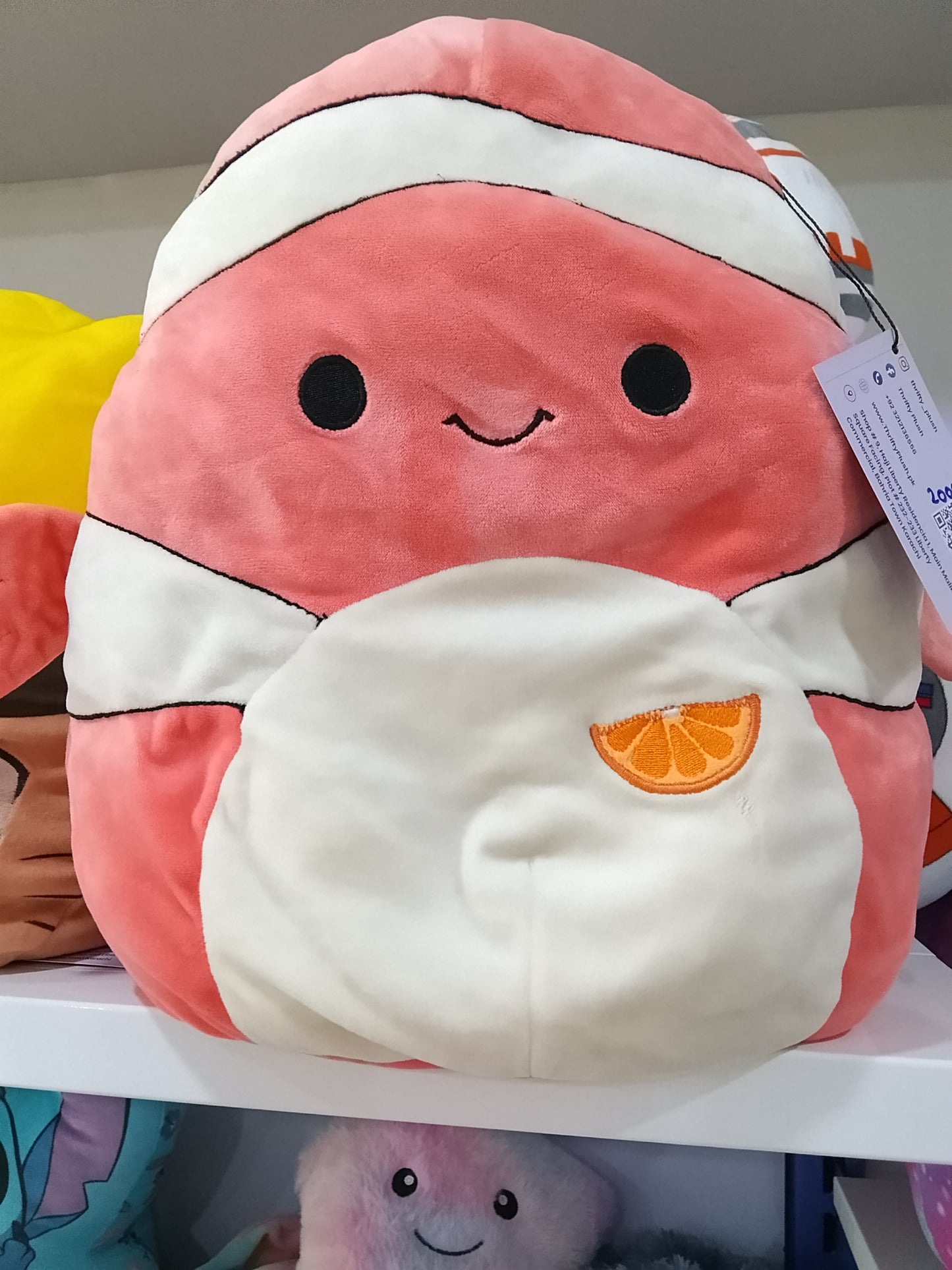 Squishmallows Ricky the Clownfish Plush toy.