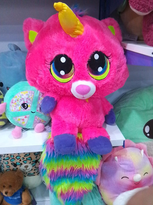 Princess Pink Kittycorn bright pink fur, a yellow unicorn horn, and a rainbow-colored mane and tail.
