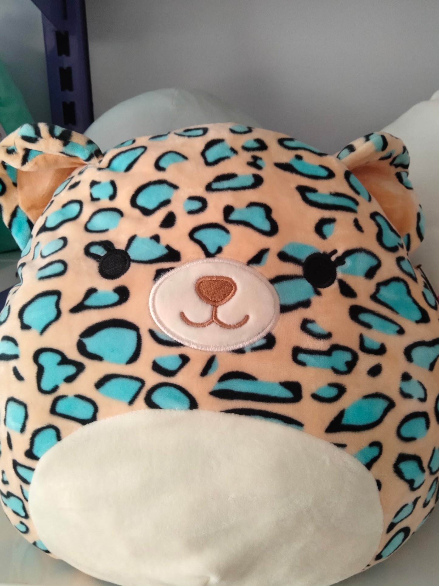 Squishmallows plush toy featuring the character Liv the Teal Leopard.