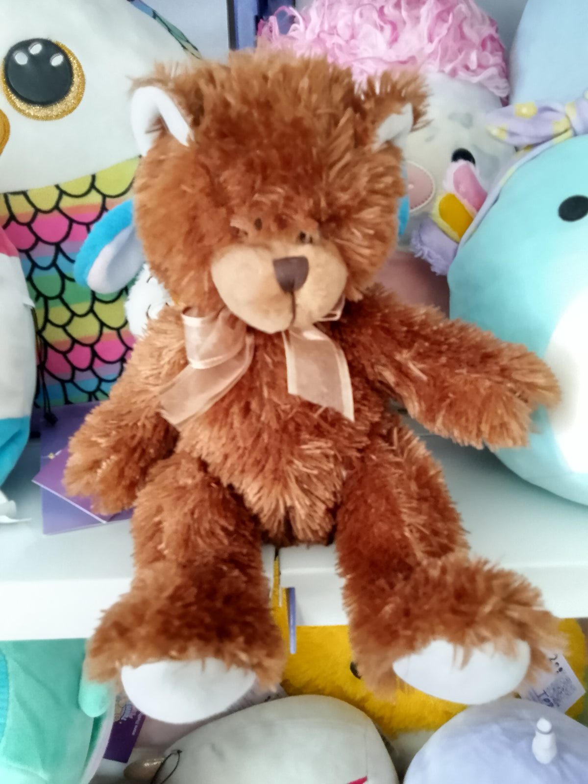 Brown Sugar teddy bear plush toy.