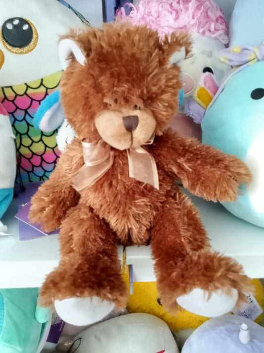 Brown Sugar teddy bear plush toy.