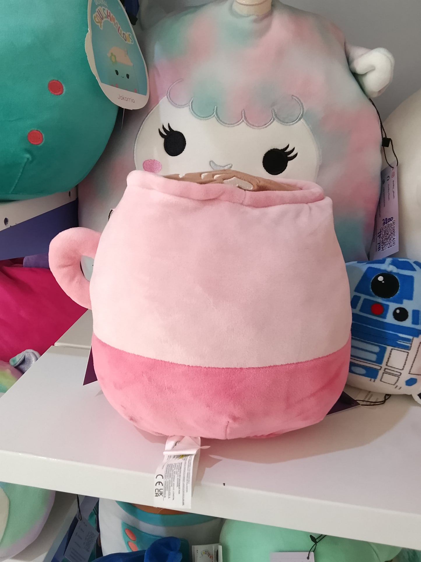Squishmallow plush toy named Emery the Latte.