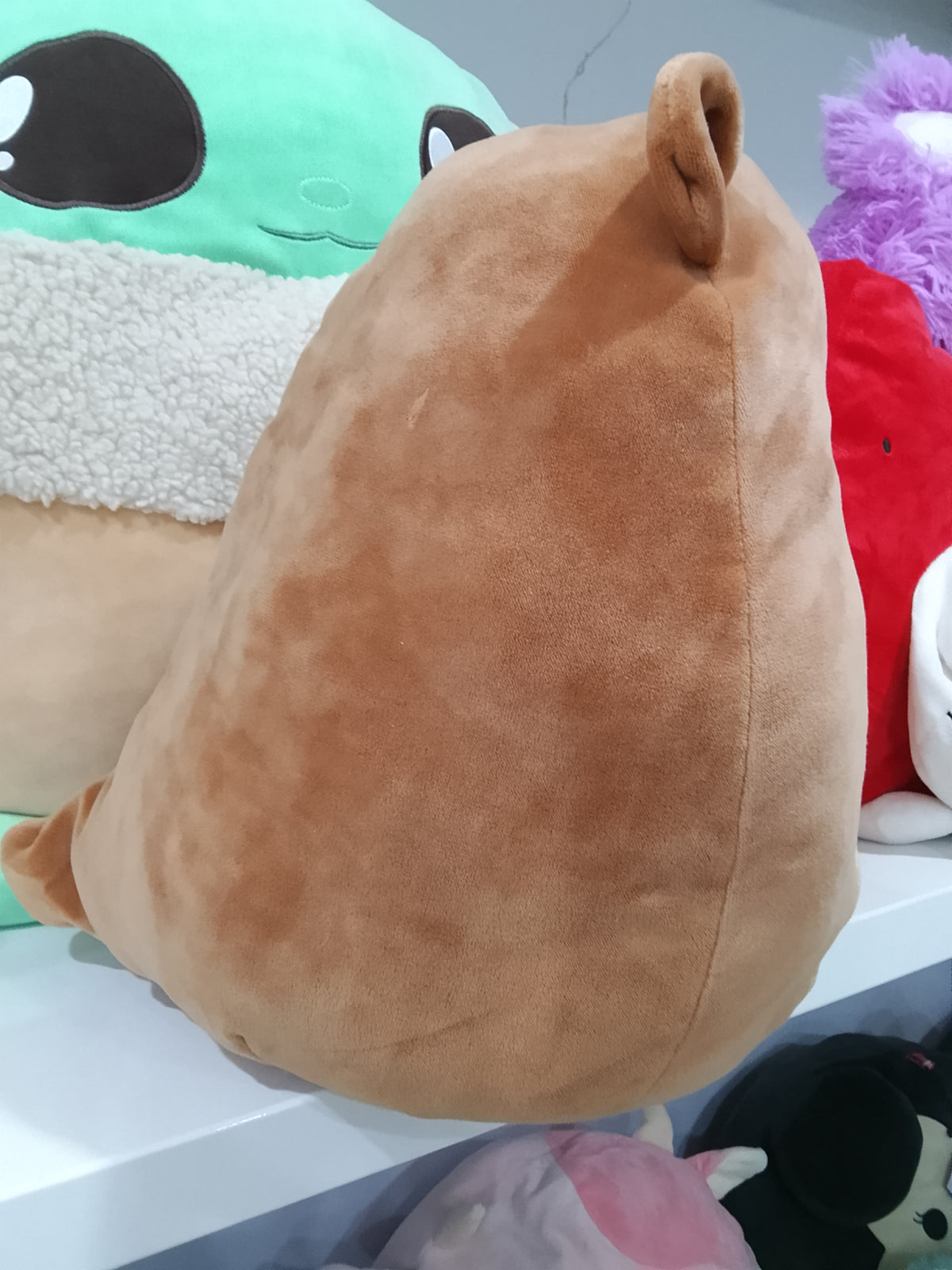 Squishmallows plush toy, specifically the character Joanne the Sea Otter.