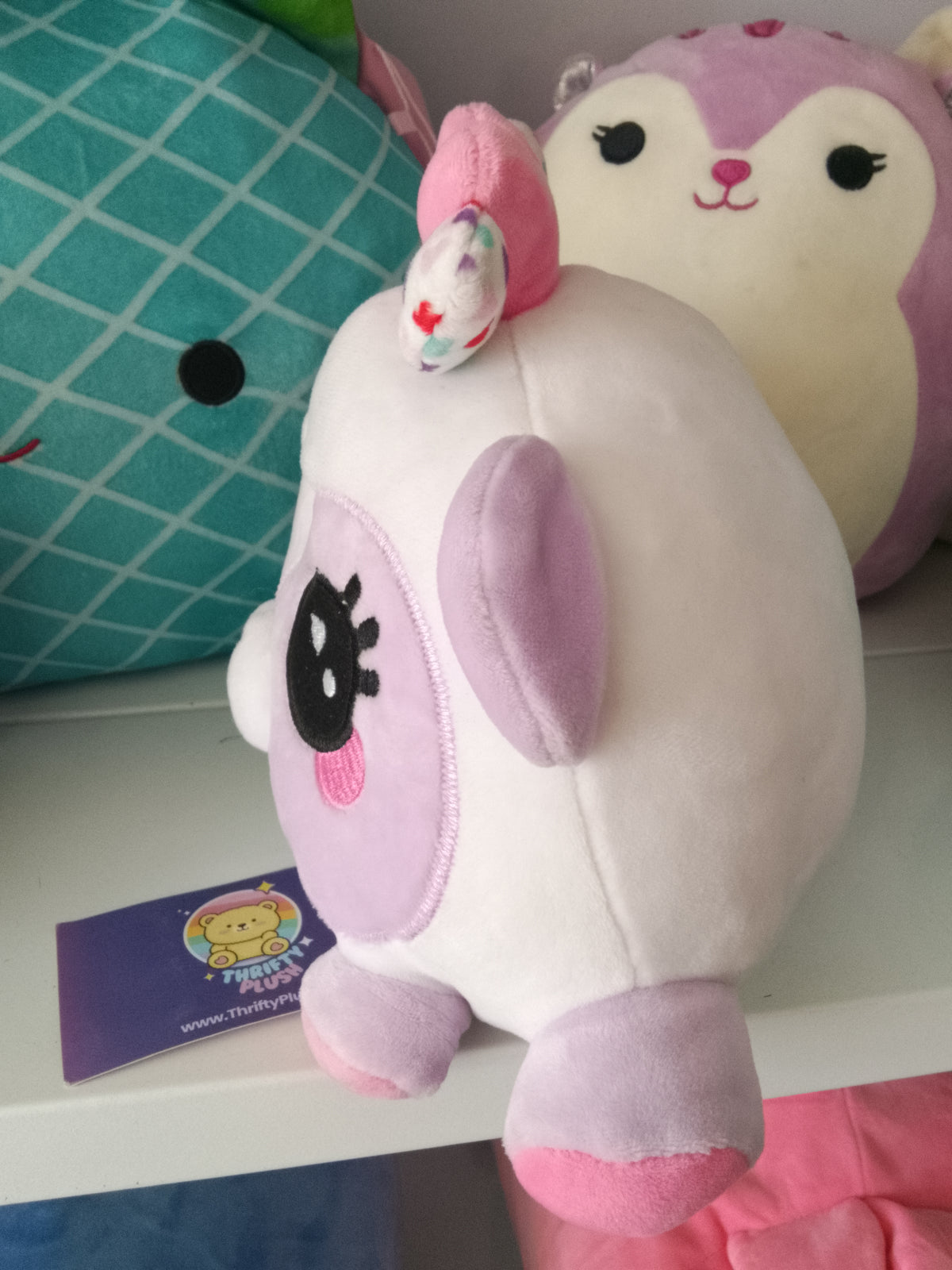 WowWee Ploosh Kissimal interactive plush toy.
