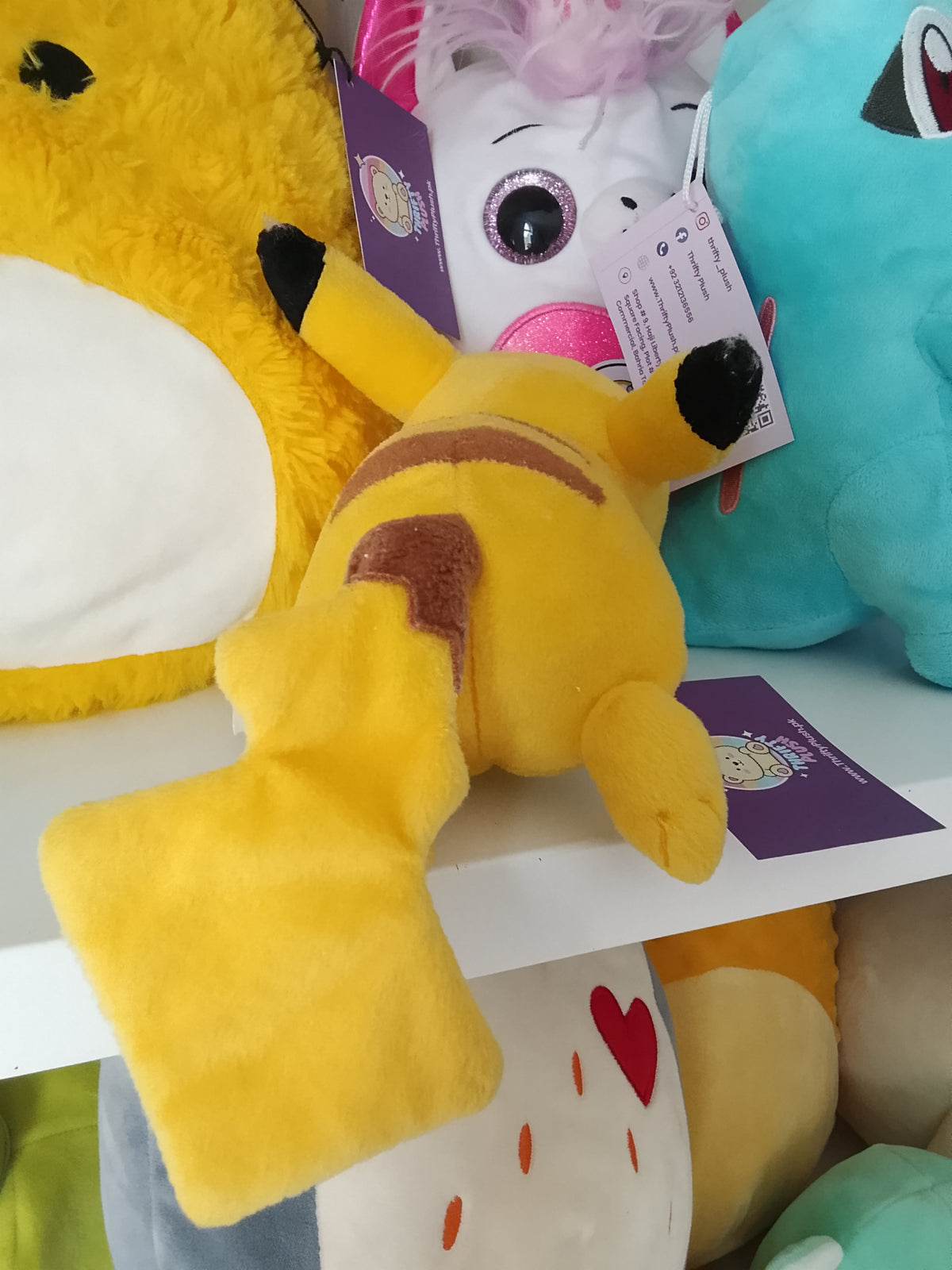 Pikachu plush toy from the Pokémon franchise.
