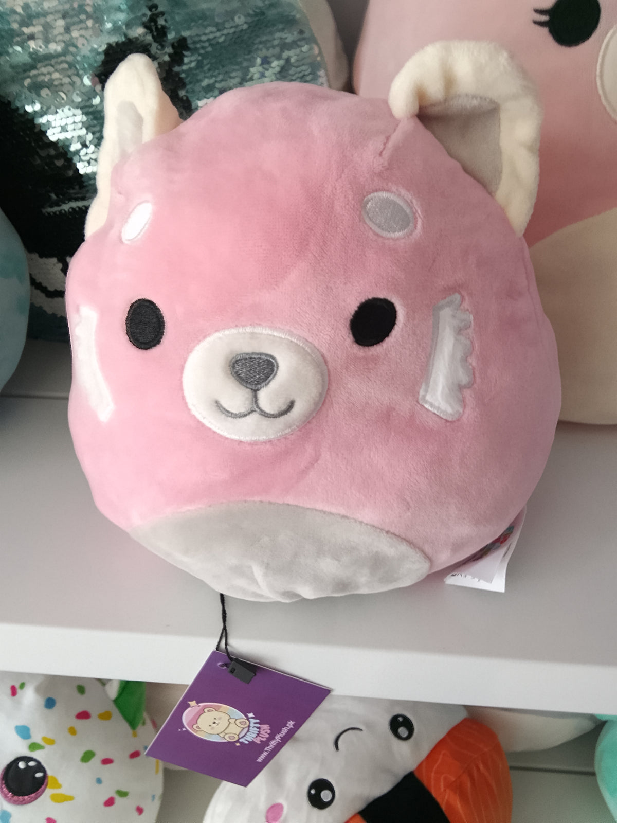 Squishmallows Flip-a-Mallow plush Dohna the Pink Panda and Mischa the Snow Leopard.