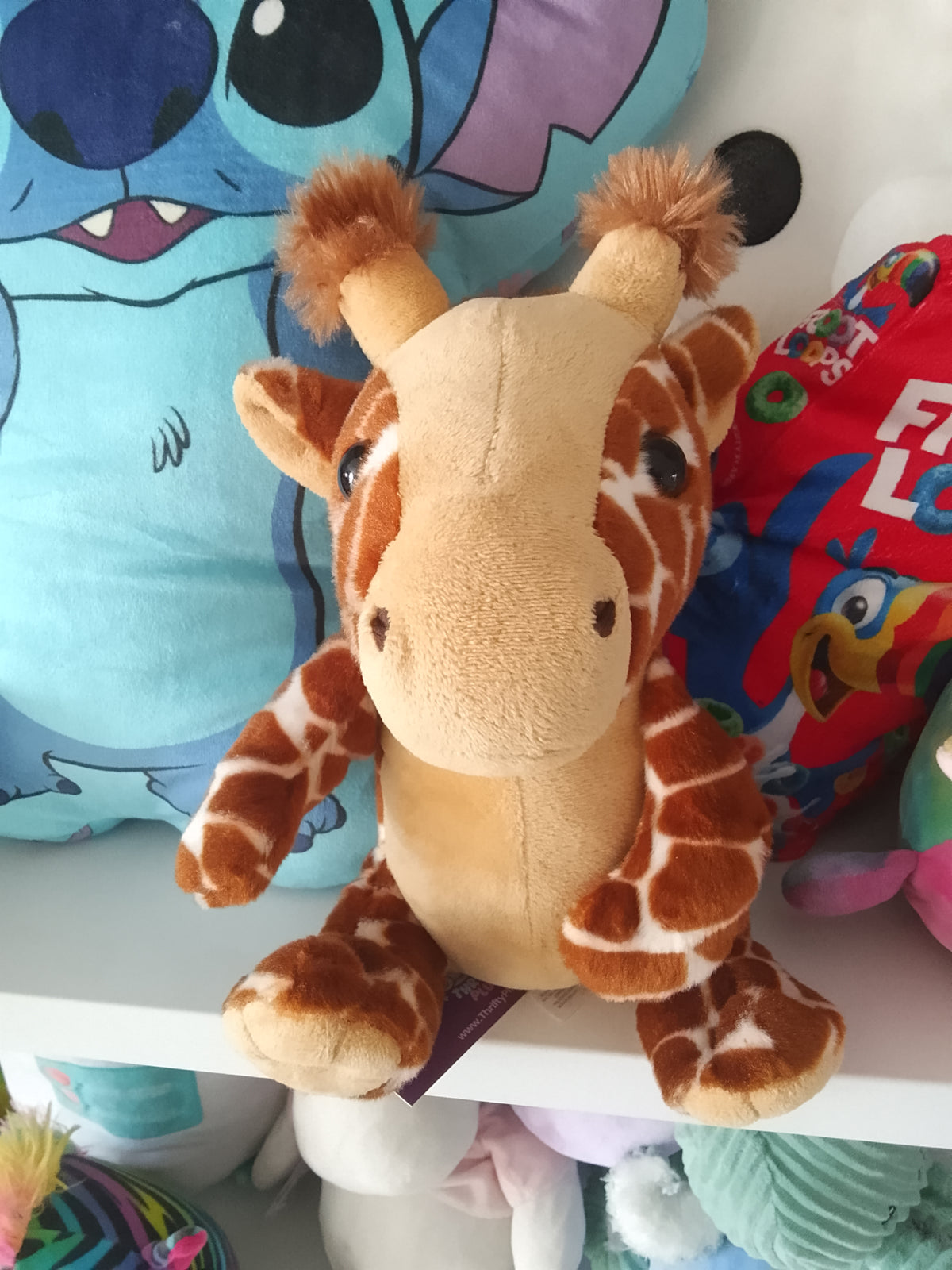 Stuffed giraffe plush toy