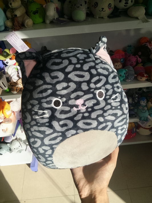 Squishmallows plush toy Xiomara the Black Panther in a grey and black leopard print.