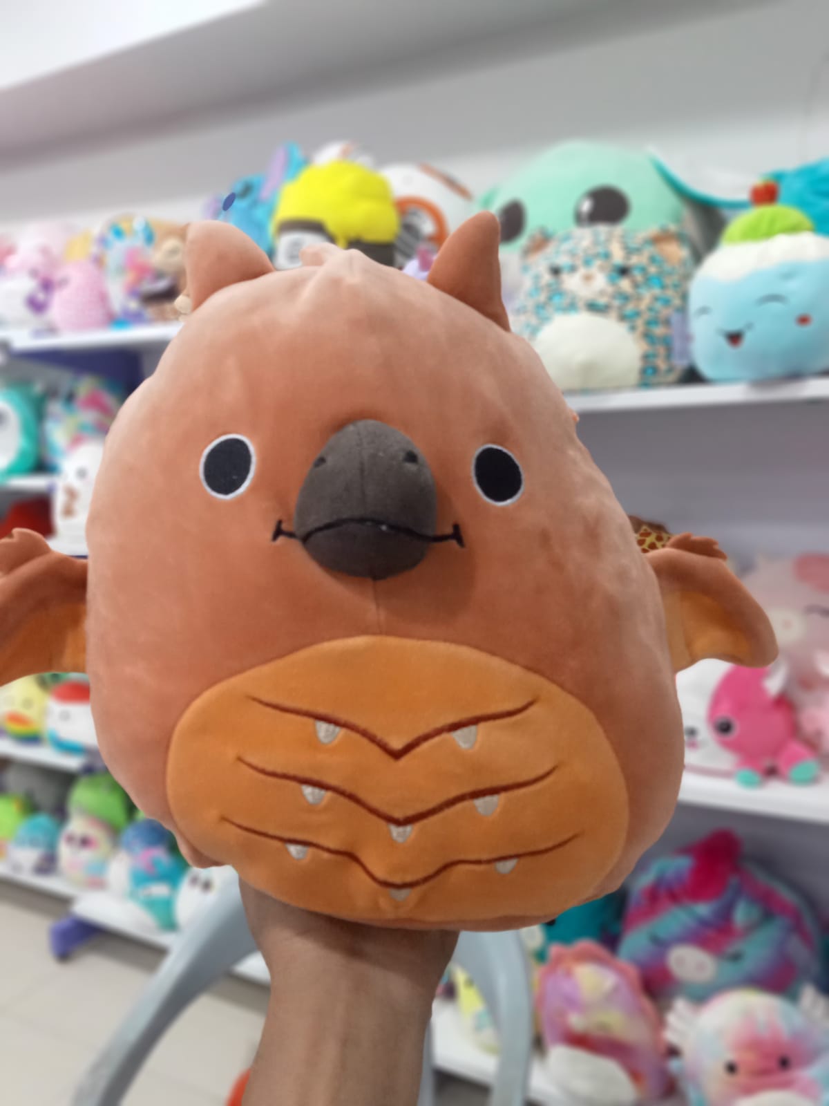 Squishmallows Godzilla Rodan plush toy.