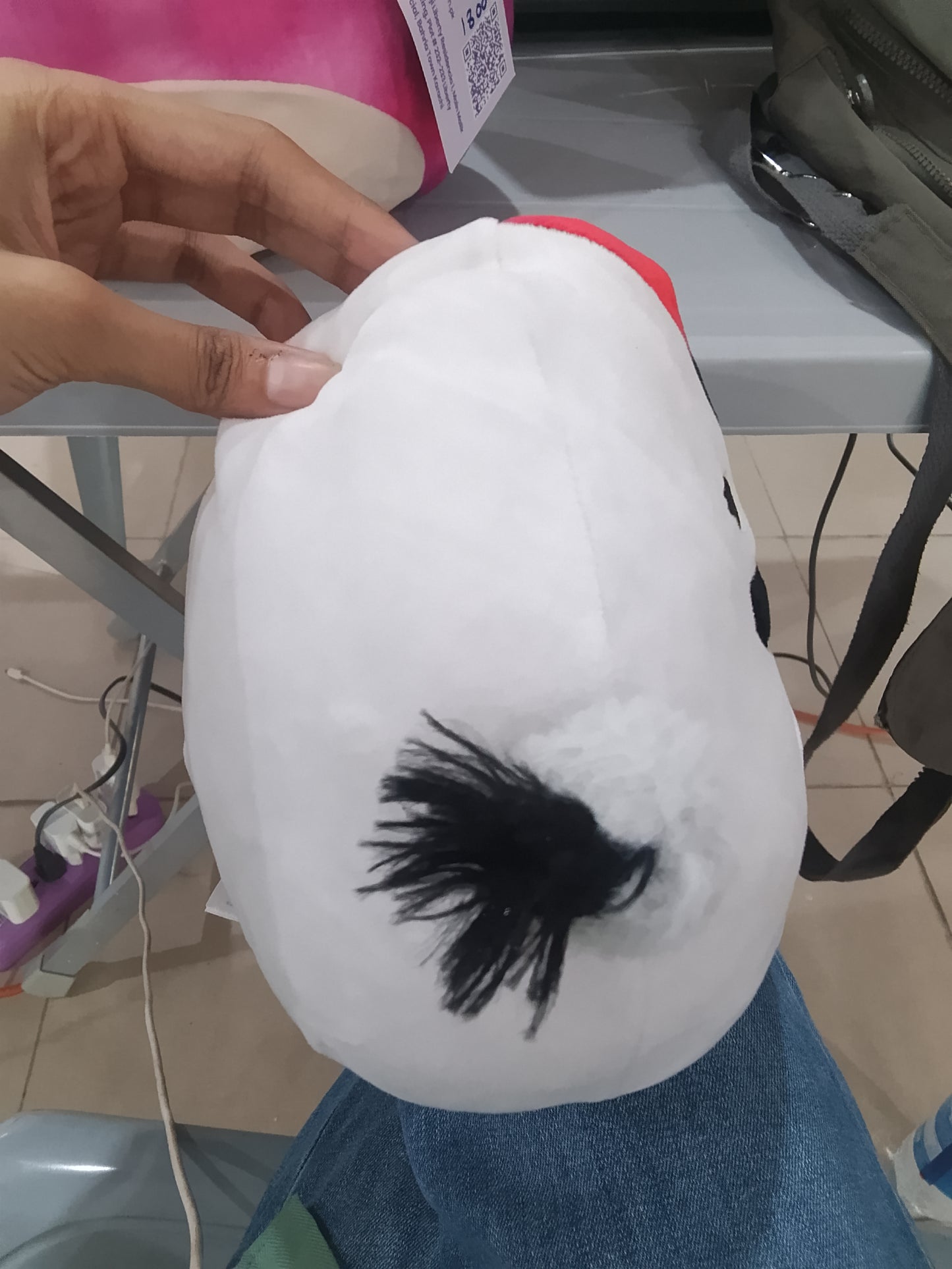 Squishmallow Basma the Whooping Crane plush toy.